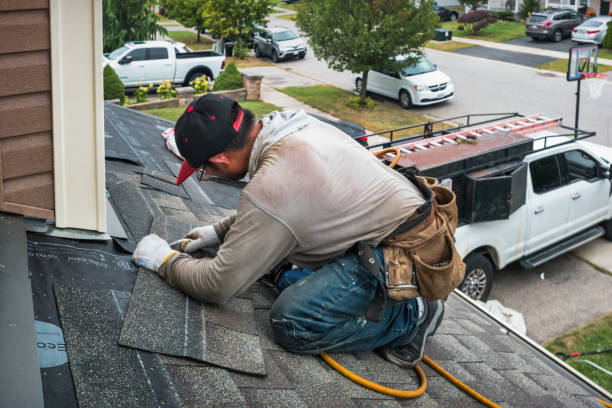 Professional Gutter Repair And Installation technician working in Eau Claire, MI